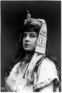 Maria Gay, head-and-shoulders portrait, facing left, as Aida in costume with exotic headdress and snake ornament LCCN91796474