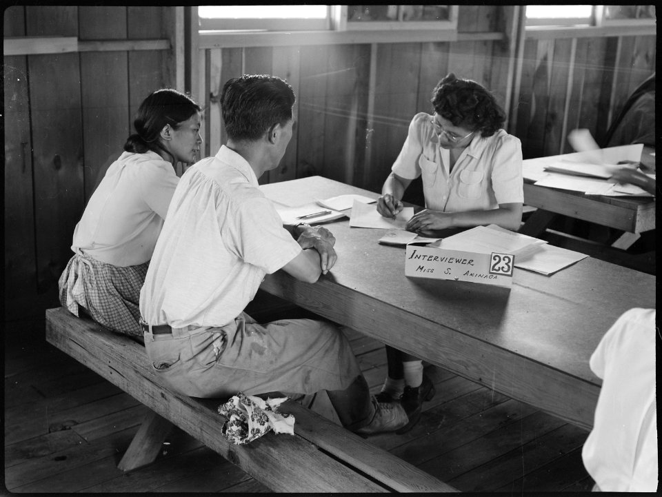 Manzanar Relocation Center, Manzanar, California. Miss. S. Akinaga, one of a staff of 40 interviewe . . . - NARA - 538165