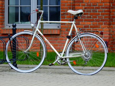 Old bike wheel walkway photo