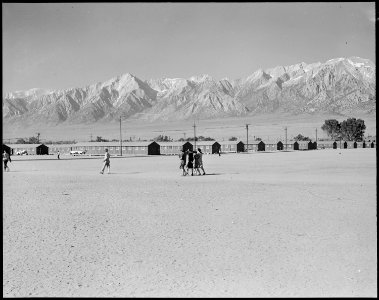 Manzanar Relocation Center, Manzanar, California. This War Relocation Authority center which houses . . . - NARA - 538123 photo