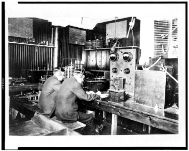 Marconi wireless school, New York. Operators copying messages transmitted from ships at sea LCCN93504726