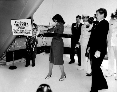 Marilyn Quayle christens the Aegis guided missile cruiser USS VINCENNES