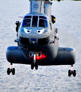 Marine CH-46E helicopter assigned to the Evil Eyes of Marine Medium Helicopter Squadron (HMM) 163 (REIN) lands