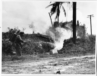 Marine flamethrower near Sumay golf course, Guam, July 1944