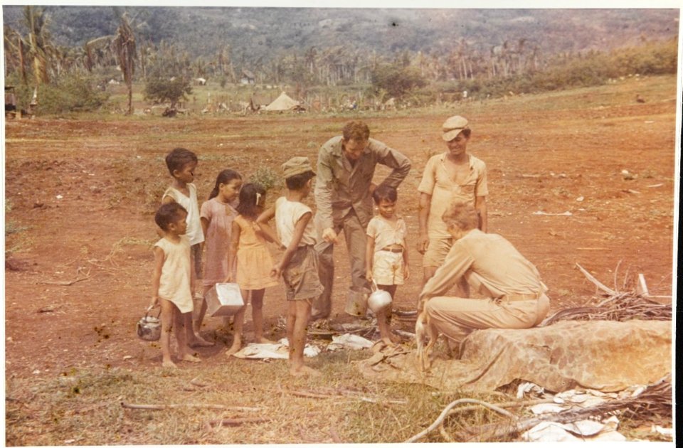 Marines talking to Guam children, August 1944