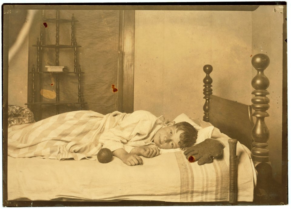 Miscellaneous. Boy in bed-awake. LOC nclc.05273