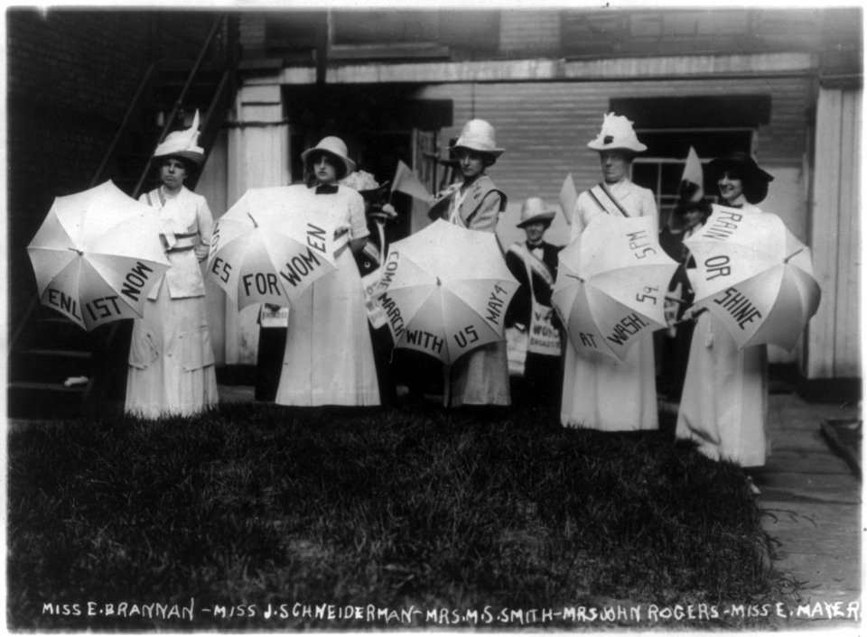 Miss (E.) Brannan, Miss (J.S.) Schweiderman, Mrs. (M.S.) Smith, Mrs. (John) Rogers, and Miss (E.) Mayer (holding umberllas), New York City, May 1912 LCCN2001704323