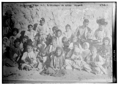Missionary from U.S. & children of Kurd village LCCN2014701086