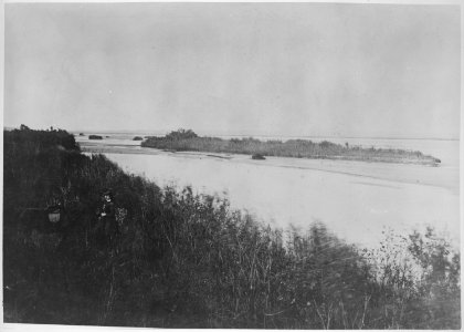 Missouri River near Omaha Indian Agency. Mrs. W.H. Jackson in foreground. - NARA - 516607 photo