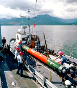 Mk 48 torpedo on hoist 1982 photo