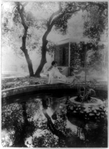 Mme. Helena Modjeska, three-quarter length portrait, seated, facing slightly right, beside pond outside her house, California LCCN90707249 photo