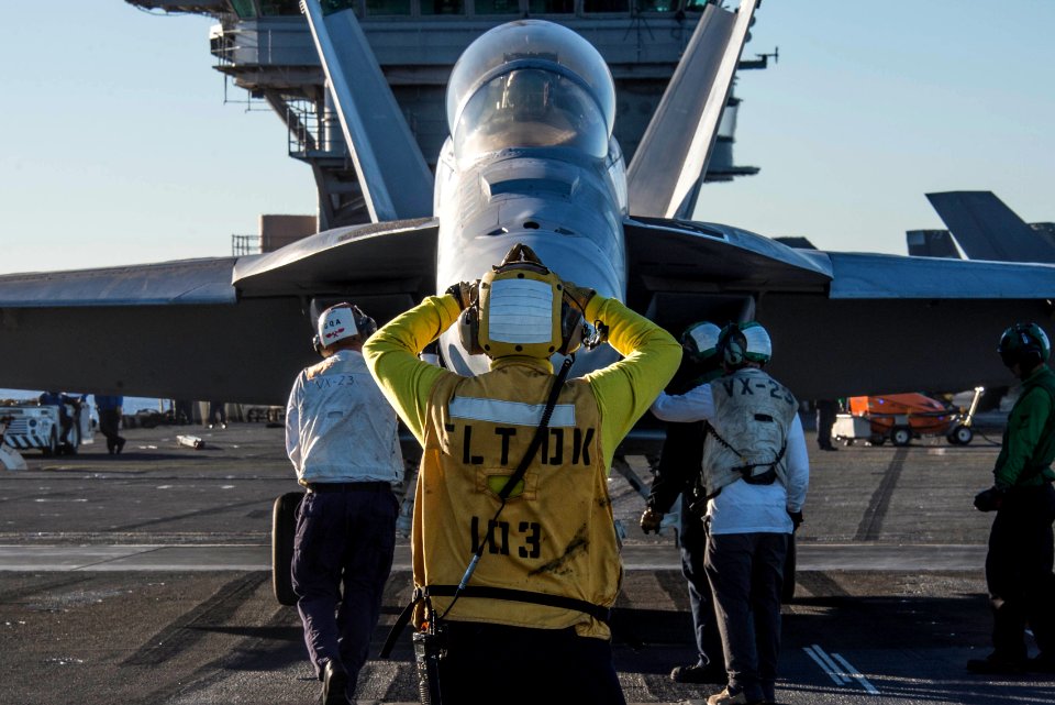 Nimitz Sailor directs Hornet onto catapult 141104-N-IP743-094