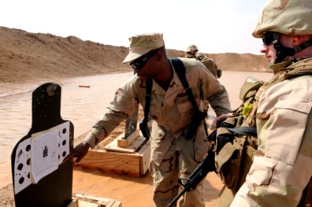 NMCB 11 Seabees at firing range 120219-N-UH337-042
