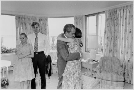 Nixon hugging Julie shortly after his resignation - NARA - 194592 photo