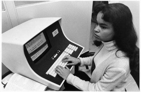 No original caption. (African-American woman computer operator) - NARA - 558656 photo
