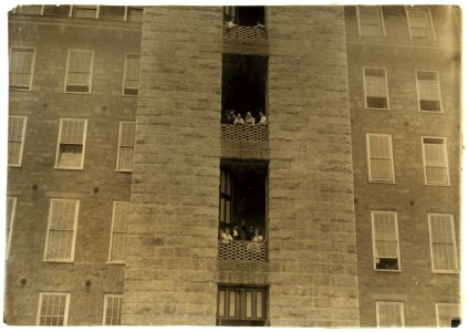 Noon hour - Merchants Mill. Girls flirting with passersby. LOC nclc.03097