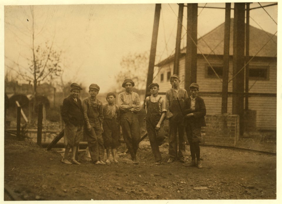 Noon hour at Avondale Mills. The youngest boy (on left end) said he had been doffing there four years. LOC nclc.01938