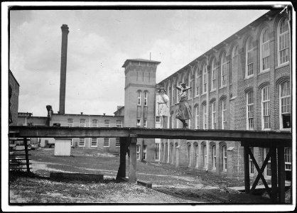 Noon hour, two of the young workers in Laurel Cotton Mills. Laurel, Miss. - NARA - 523421