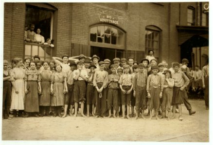 Noon-hour at the Riverside Cotton Mills, Danville, Va. Group of spinners, doffers, etc. All work. Some here are surely under fourteen, but not many. LOC nclc.02170