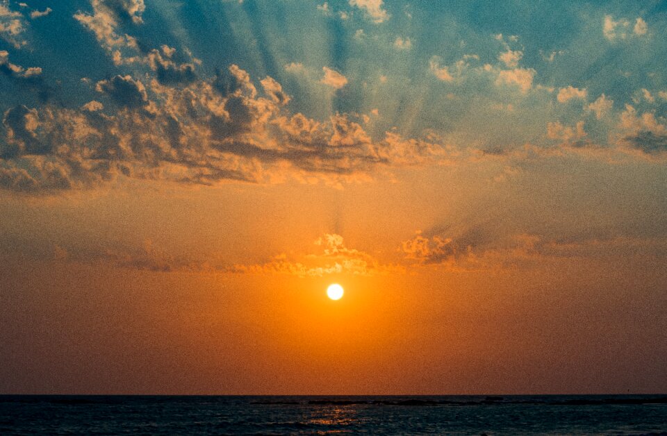 Water sun sky