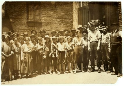 Noon-hour at Riverside Cotton Mills, Danville, Va. All are workers. The Suprt., who posed them, said, 'Be sure not to get any little dinner-toters in the photo. We have none working under LOC nclc.02167 photo