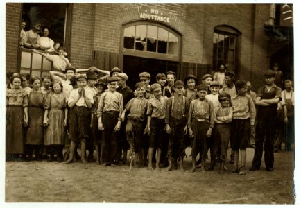 Noon-hour at the Riverside Cotton Mills, Danville, Va. Group of spinners, doffers, etc. All work. Some here are surely under fourteen, but not many. LOC cph.3b24202 photo