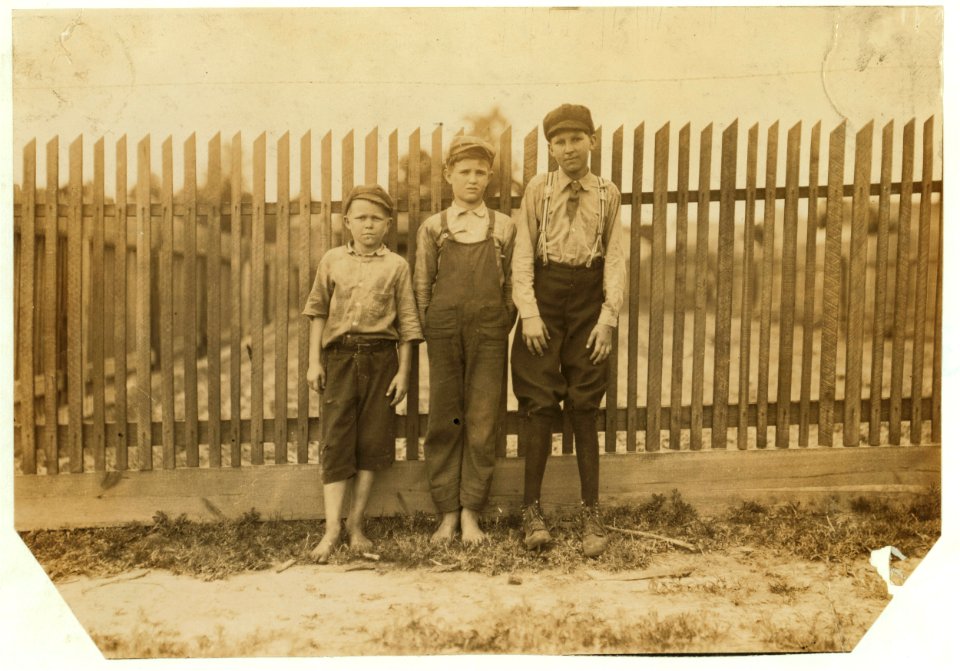 Noon at Delta Cotton Mills, Mc Comb, Miss. Three of the young workers. LOC nclc.02072