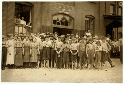 Noon-hour at the Riverside Cotton Mills, Danville, Va. Group of spinners, doffers, etc. All work. Some here are surely under fourteen, but not many. LOC nclc.02170 photo