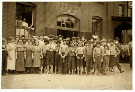Noon-hour at the Riverside Cotton Mills, Danville, Va. Group of spinners, doffers, etc. All work. Some here are surely under fourteen, but not many. LOC nclc.02170