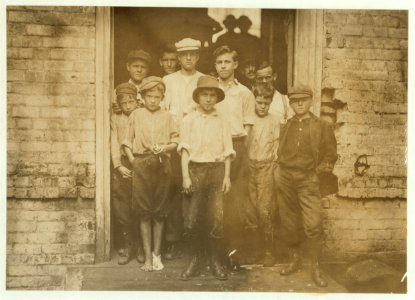 Noon. Group of Doffers and sweepers in Cabarrus Mill, Concord, N.C. These are not all that were working here. LOC nclc.02648 photo