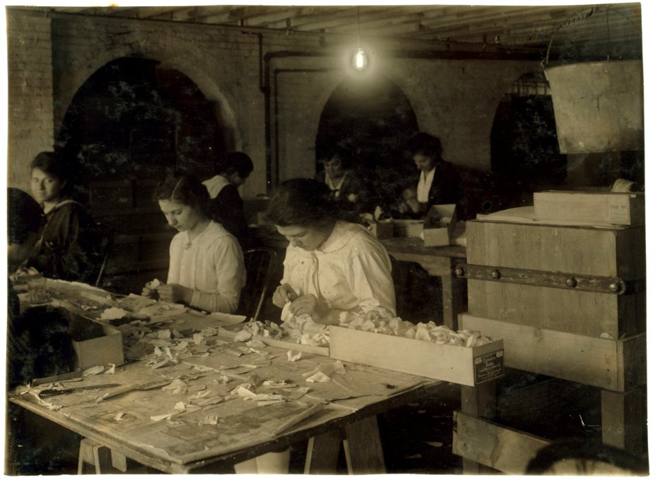 Mary Donahue, 15 years old (on right of photo), curling petals at the Boston Floral Supply Co., 347-357 Cambridge Street. Said to be the only flower factory in Massachusetts. Pauline Steele, LOC nclc.05615