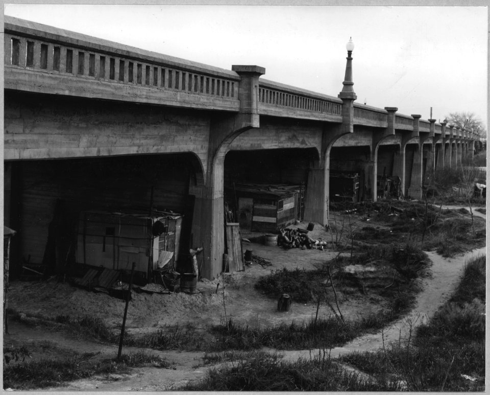 Marysville, Yuba County, California. Another view...of squatter shacks under the D Street Bridge. - NARA - 521735