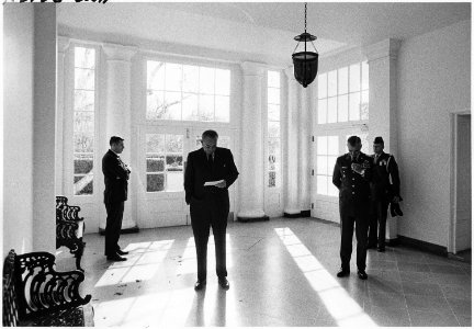 Moods, President Lyndon B. Johnson reads a document as General William Westmoreland waits - NARA - 192611 photo