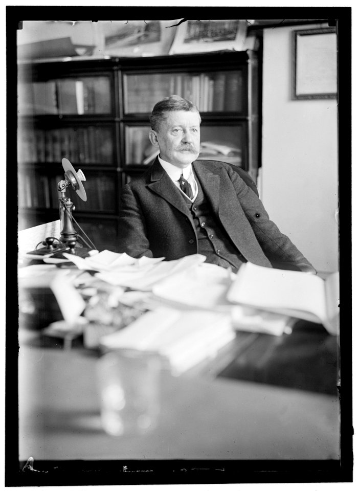 MOORE, EDWARD B. COMMISSIONER OF PATENTS. AT DESK LCCN2016864164