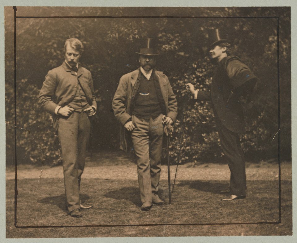 Mortimer Menpes, William M. Chase, and James McNeill Whistler standing together outdoors LCCN2013650257