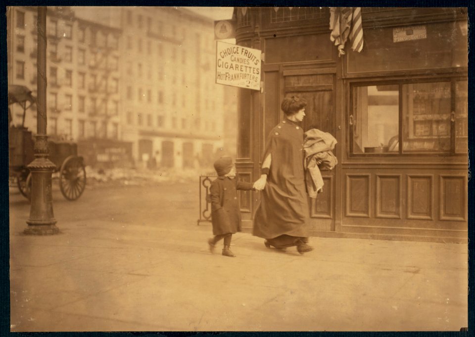 Mother and son carrying home-work. Near Astor Place, New York. LOC nclc.04161