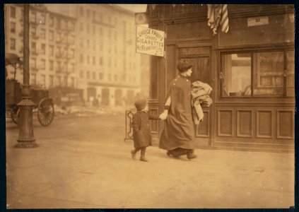 Mother and son carrying home-work. Near Astor Place, New York. LOC nclc.04161