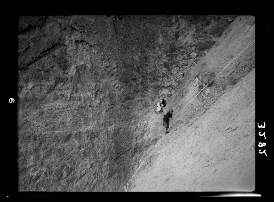 Motor boat trip around the Dead Sea. On Masada. Climbers by aid of rope reaching the ramp LOC matpc.15271