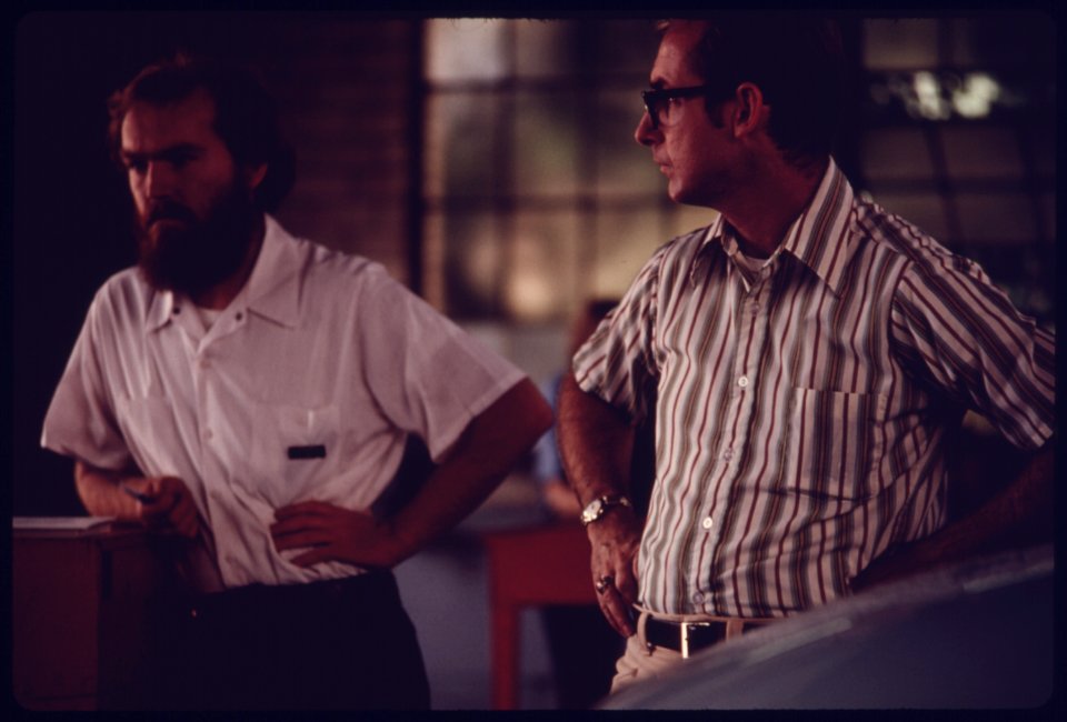 Motorist, Right, Waits for the Results of His Vehicle's Test at an Auto Emission Inspection Station in Downtown Cincinnati, Ohio...08-1975 (4265794209)