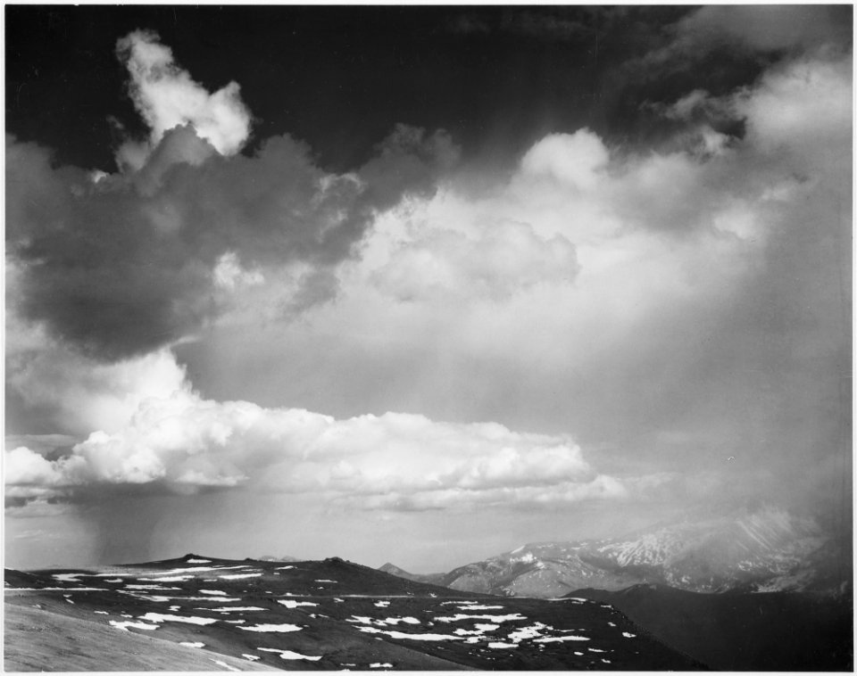 Mountain tops, low horizon, dramatic clouded sky, In Rocky Mountain National Park, Colorado, 1933 - 1942 - NARA - 519957
