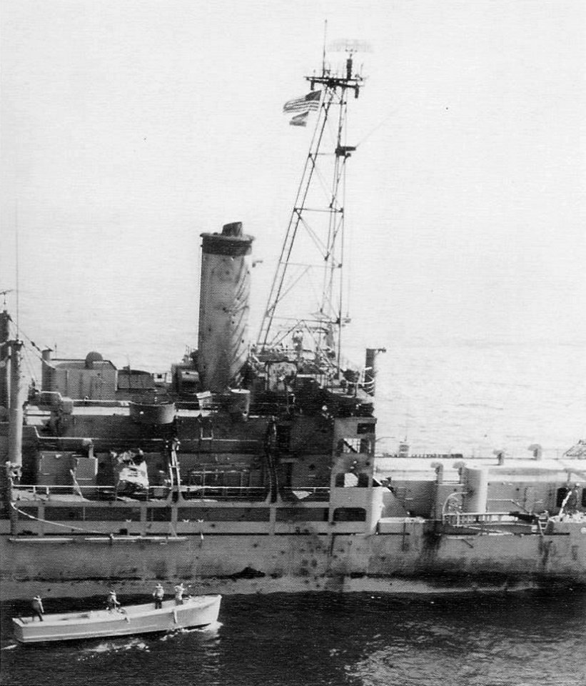 Motor whaleboat approaches the damaged USS Liberty (AGTR-5), 9 June 1967