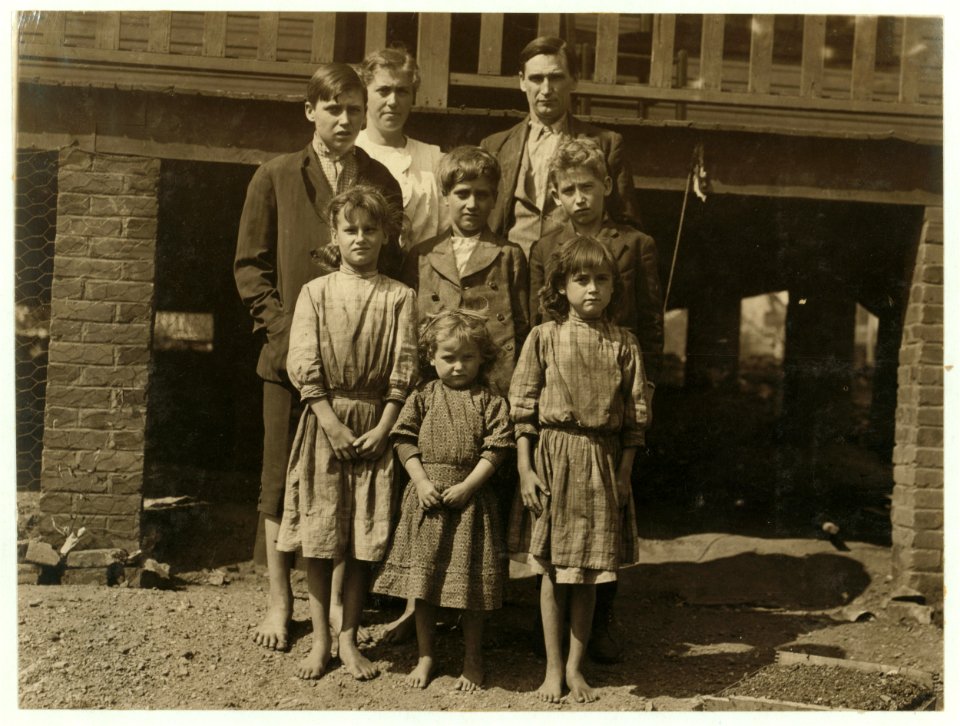 Mass(achusetts) Mills. Jo Veal and family. Father and three boys in the mill. Family record shows him born August 20, 1901, and he went to work (4 mos. ago) just over 11 years old. His wages LOC nclc.02797