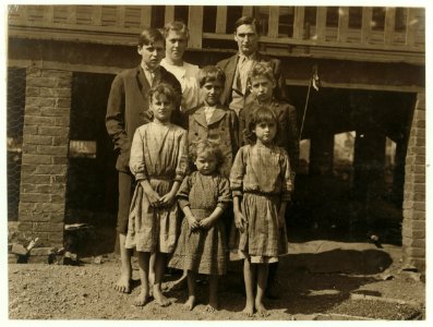Mass(achusetts) Mills. Jo Veal and family. Father and three boys in the mill. Family record shows him born August 20, 1901, and he went to work (4 mos. ago) just over 11 years old. His wages LOC nclc.02797