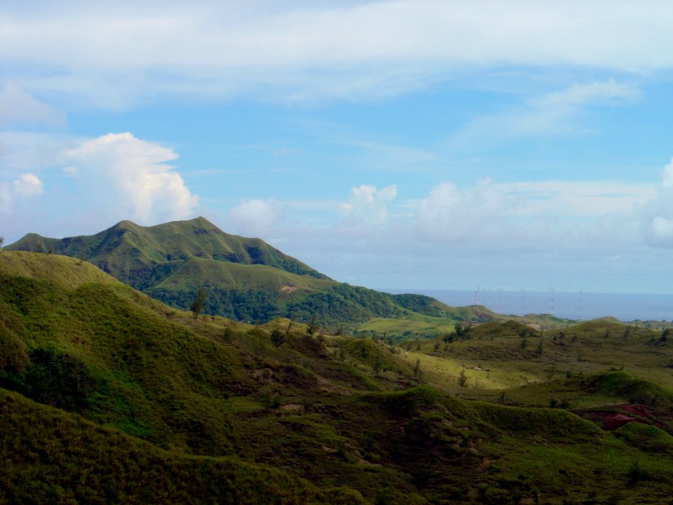 Mountains of Guam and a military antenna farm (line380841873)
