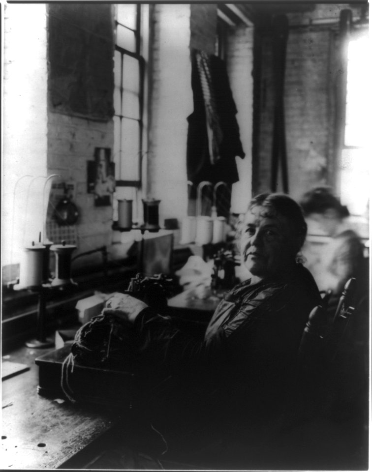 Massachusetts. Lynn. Shoe industry- Misses Kitty Connel and Mamie Green gumming linings in vamps. LCCN2016650771