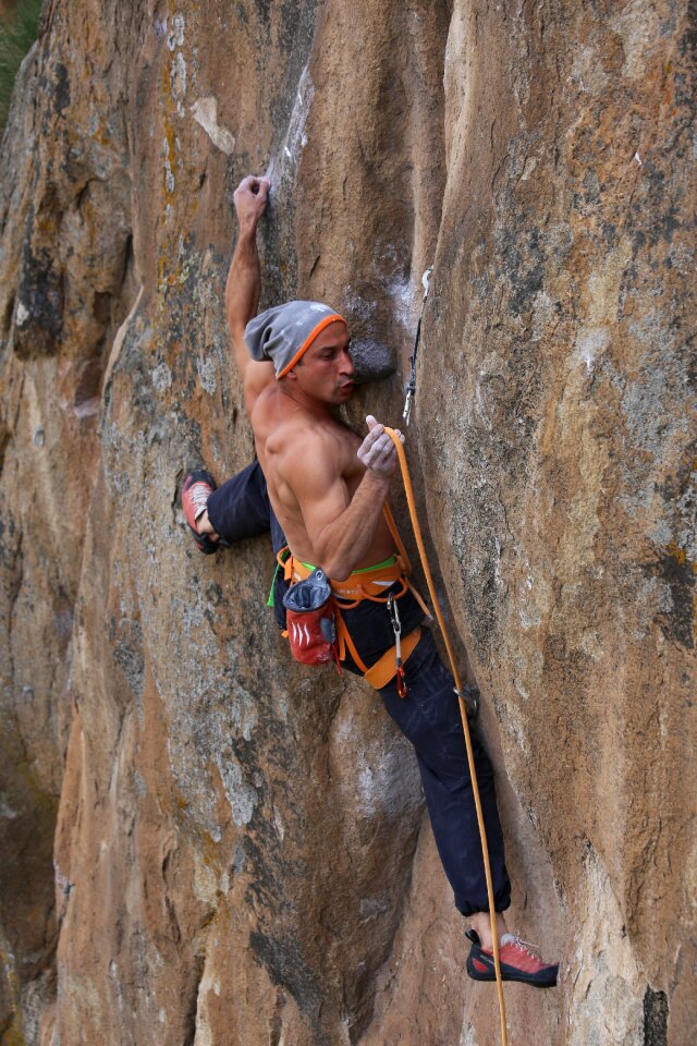 Man climbing rappelling
