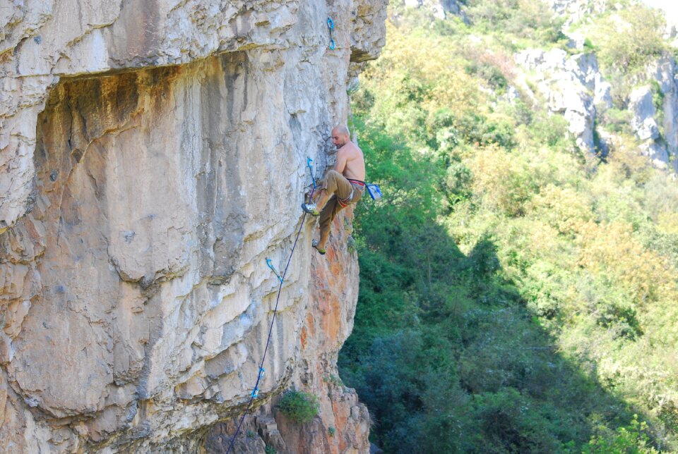 Man climbing rappelling