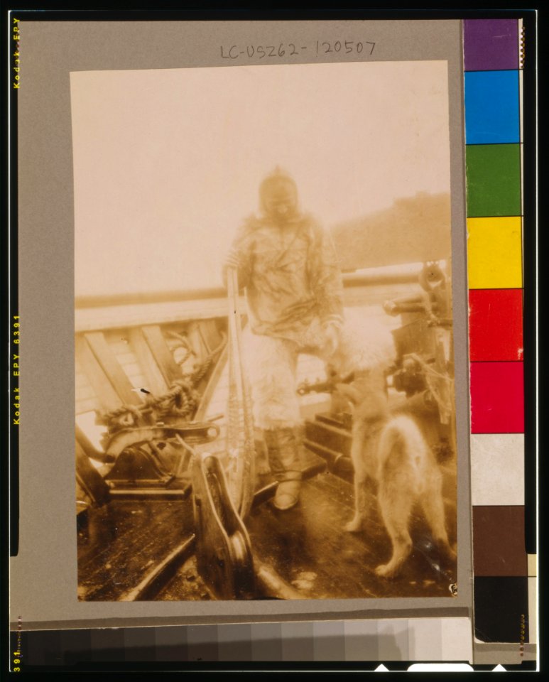Matt Henson (of Peary's crew) in Arctic costume on deck of the Roosevelt on arrival at Sidney, Nova Scotia LCCN98505308