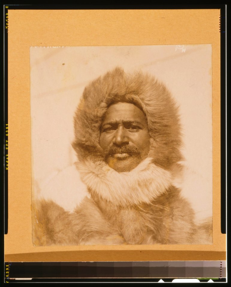 Matthew Alexander Henson, head-and-shoulders portrait, facing front, wearing fur hat and fur coat LCCN00650163