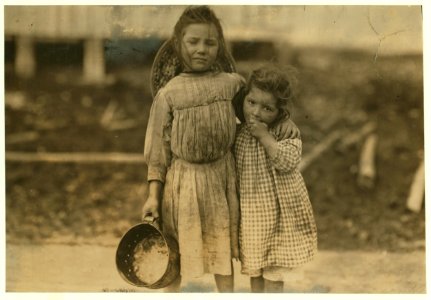 Maud Daly, five years old. Grade Daly, three years old. Each picks about one pot of shrimp a day for the Peerless Oyster Co. The youngest said to be the fastest worker. LOC cph.3a01115